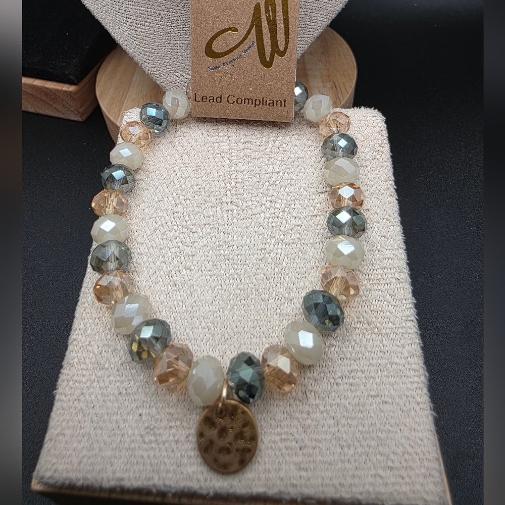 Elegant Beaded Bracelet with Gold Charm (1951)